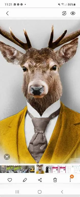 a picture of a deer wearing a suit and tie at Beautiful studio chalet in the Highlands in Inverness