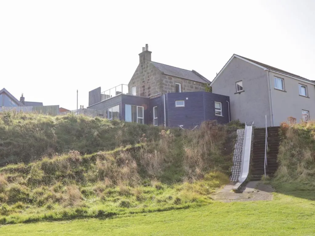 a house sitting on top of a hill at Seaview at The Doocot in Elgin