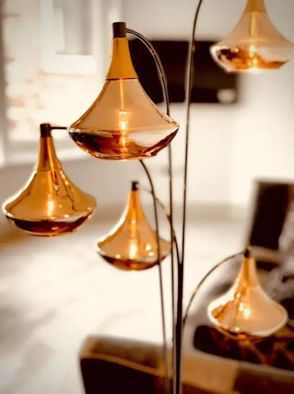 a group of three lights on a table at No 49 a spacious executive apartment in Inverness in Inverness