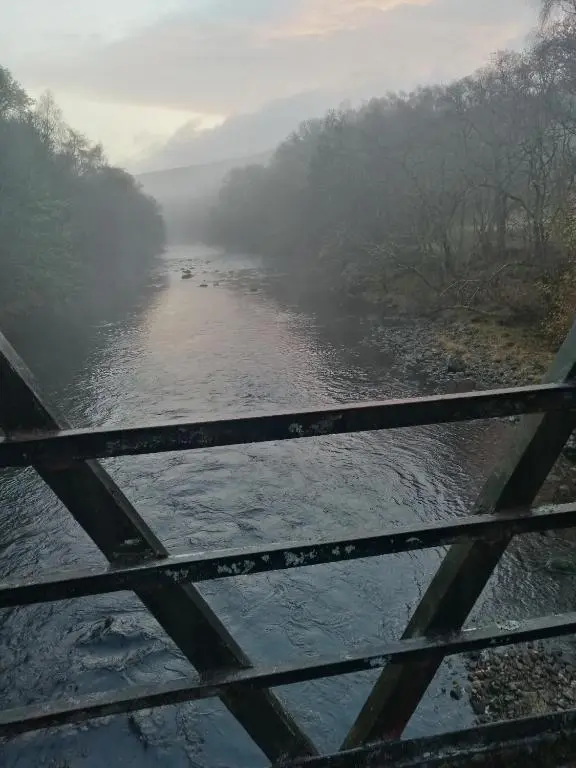 a view of a river from a bridge at Corrie View in Invergarry