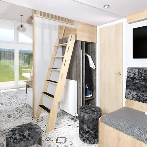a bedroom with a bunk bed with a ladder in it at The Willy Gunn Pod - Beautiful, luxury pod in Aberlour