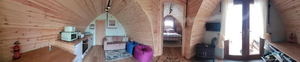 an overhead view of a room in a wooden house at Achmeney Glamping larger than Average pod in Halkirk