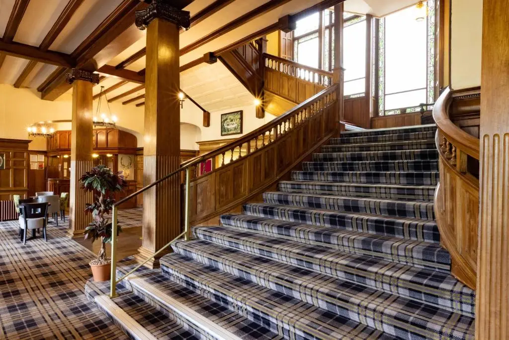 an image of a staircase in a building at The Highland Hotel by Compass Hospitality in Strathpeffer