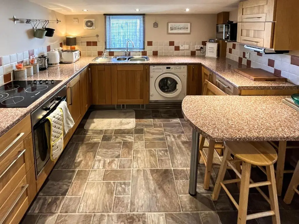 a kitchen with a sink and a dishwasher at Portknockie Escape in Portknockie