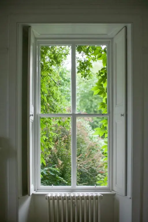 an open window in a room with a radiator at Beautiful Listed Mansion with incredible woodland views in Huntly