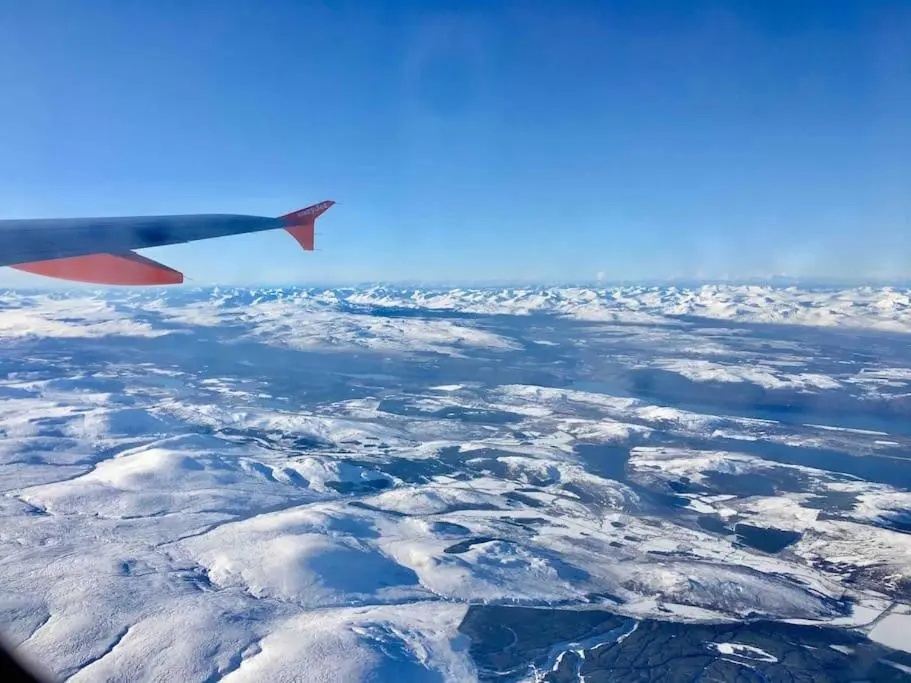 an view of snow covered ground from an airplane at The Presbytery, Forres in Forres