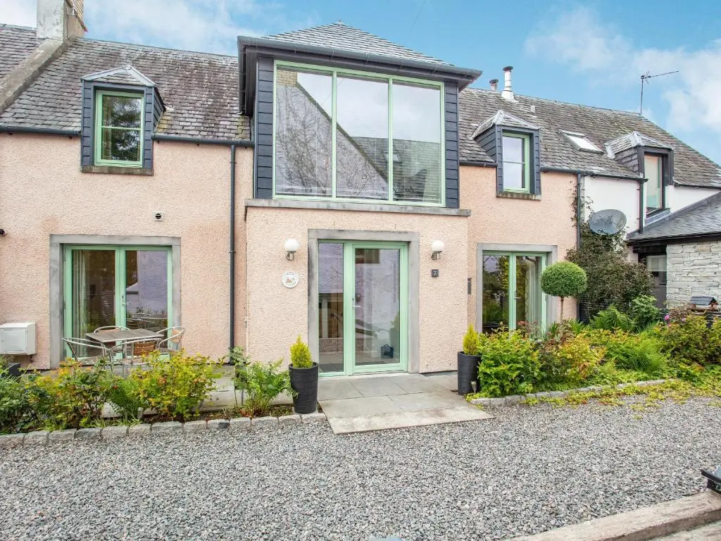 an image of a house with a driveway at Rose Cottage - Uk39245 in Inverness