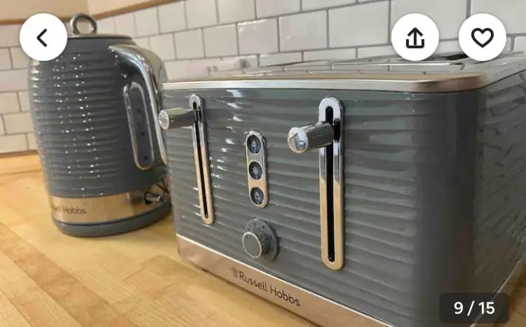 a metal toaster sitting on top of a counter at The Castle Front Nest in Inverness