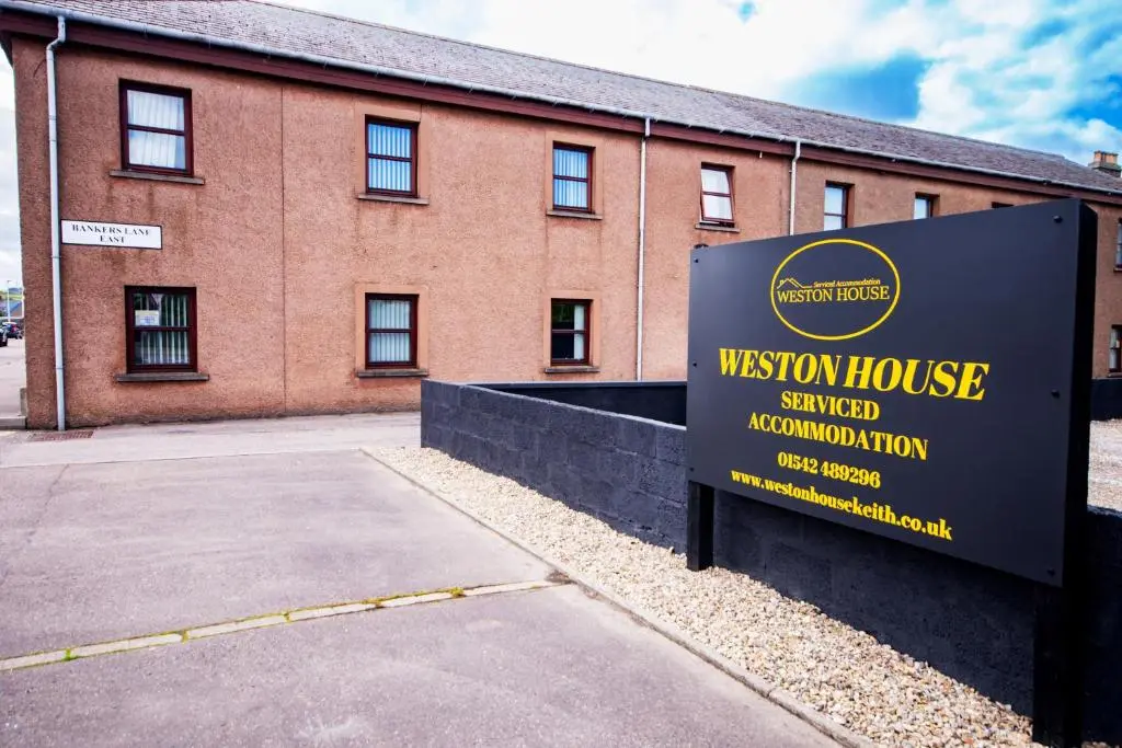 a sign in front of a building at Weston House Keith in Keith