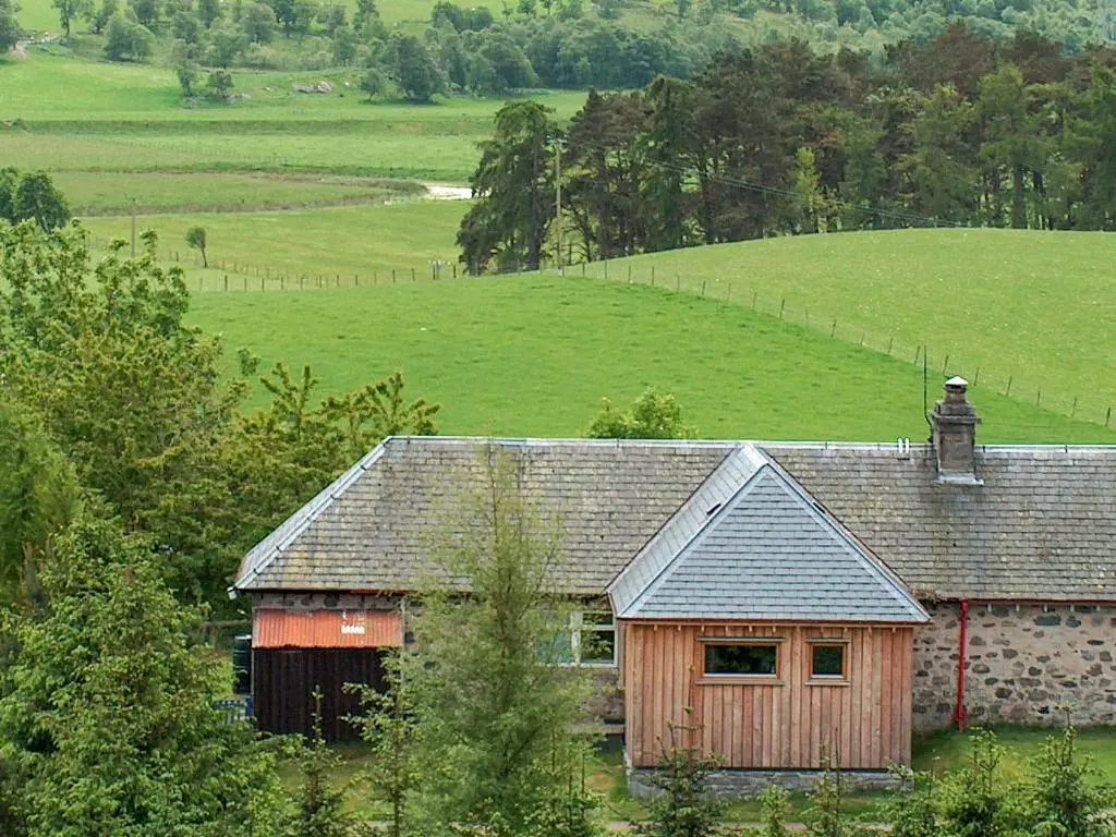 an old barn in the middle of a field at Tigh Beag in Newtonmore