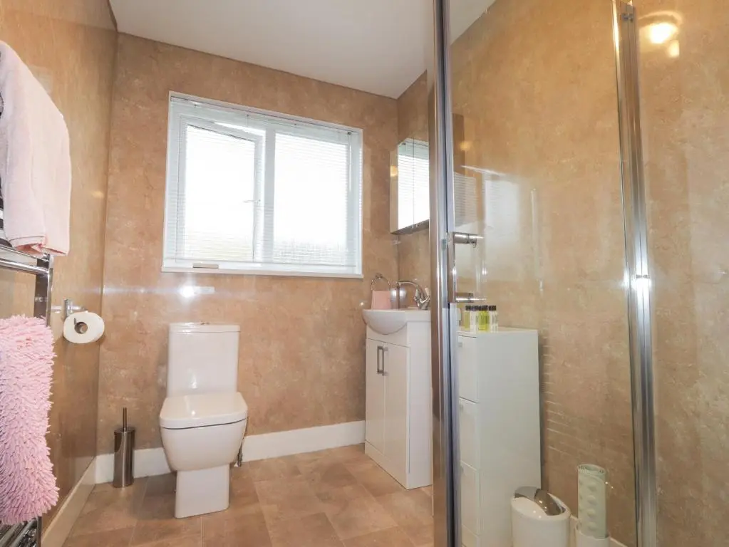 a bathroom with a toilet and a shower at Tommy's in Inverness