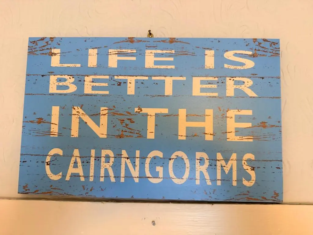 a sign that says life is better in the camprons at Spacious 2 Bedroom Flat in heart of Ballater in Ballater