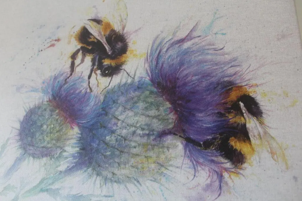 a painting of three bees on top of a flower at Trafford Bank Guest House in South Kessock