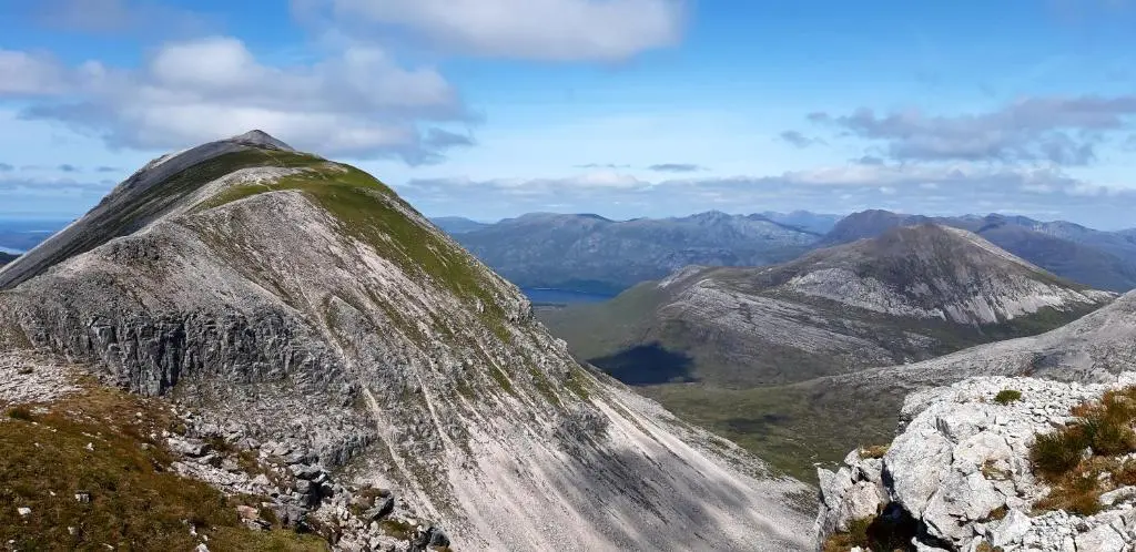 a view of a mountain with mountains in the background at 1 Bed Flat - Sleeps 4 - Garden - Parking - Wifi in Inverness
