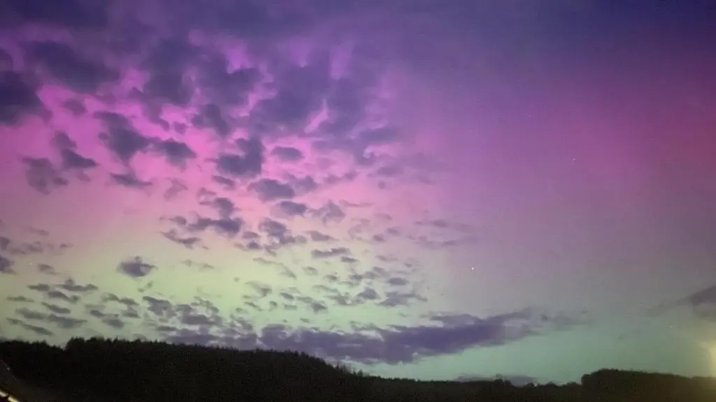a purple and pink sky with clouds at Loch Ness Hideaway Pod in Lewiston
