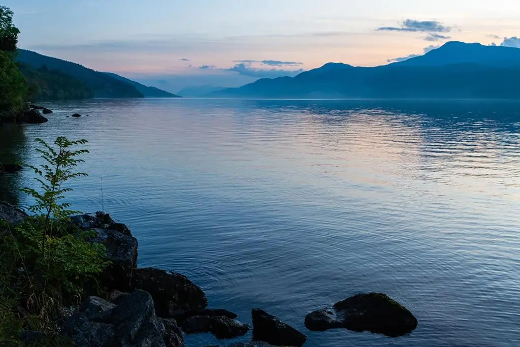 a view of a large body of water at sunset at Apartment at Drummond Crescent in Inverness