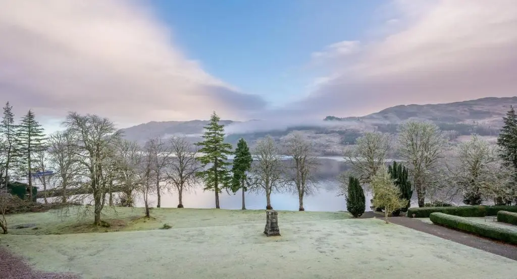 a park with a view of a body of water at Monastery apartment with Loch Ness view in Fort Augustus