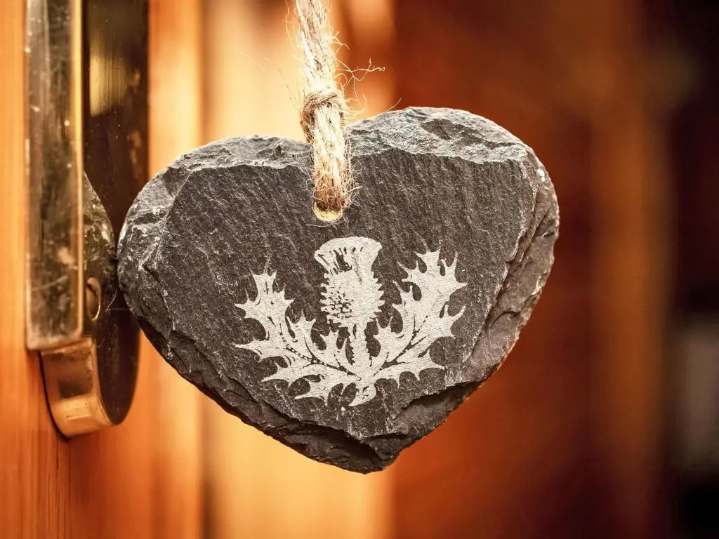 a heart shaped rock with a drawing of a lobster on it at Holiday Home Achmony Number 11 by Interhome in Drumnadrochit