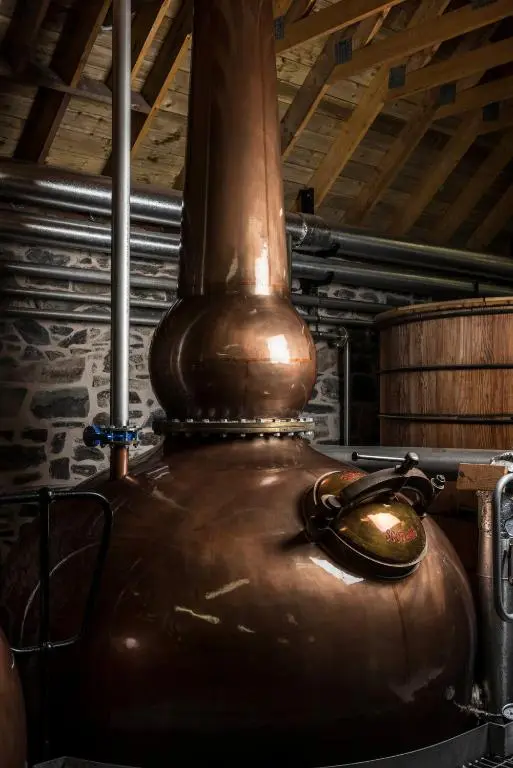 a large copper stove in a building at The Delnashaugh in Ballindalloch