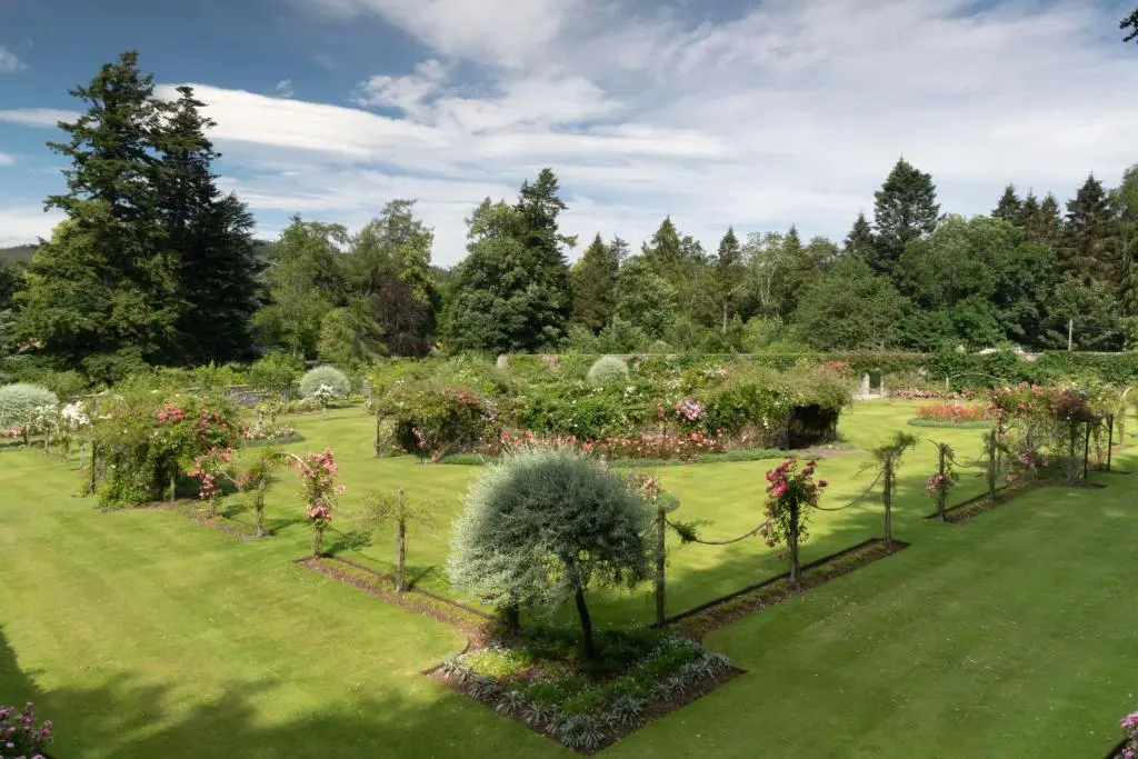 a garden with flowers and plants in a field at The Delnashaugh in Ballindalloch