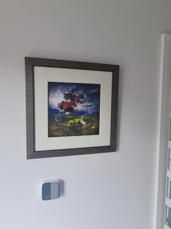 a framed picture of a truck on a wall at Faillie in Inverness